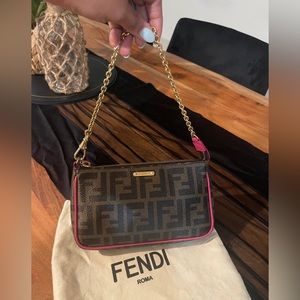 Fendi FF logo bag with a chain shoulder strap with fuchsia piping